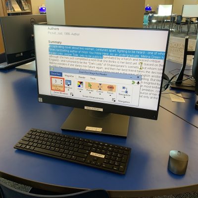 Computer with Assistive Technology ZoomText software zooming into the library catalog at Bay County Public Library Youth Services.