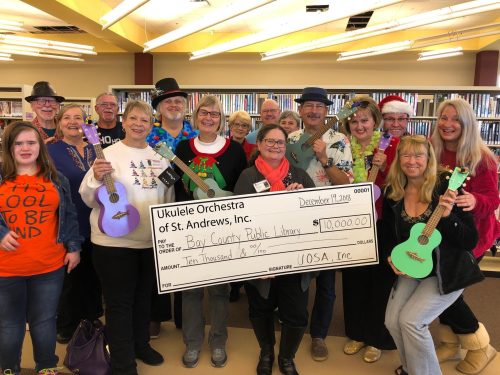 Ukulele Orchestra Check to the Library